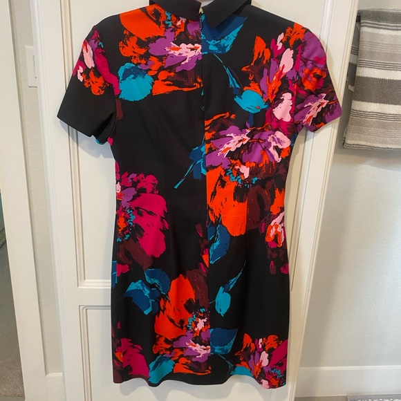 Trina Turk sassy dress. Back zipper. Lacy detail at bottom. Excellent condition! - Picture 1 of 3